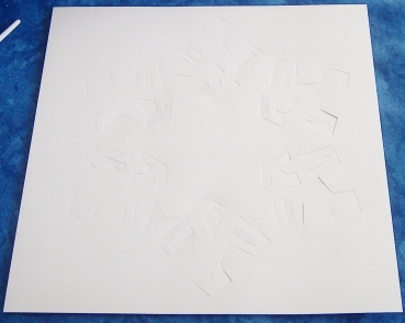 Vorgestanzter Stern aus Perlmuttpapier zum Dekorieren