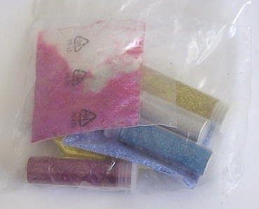 Set aus verschiedenen Flimmer im Röhrchen oder im Tütchen
