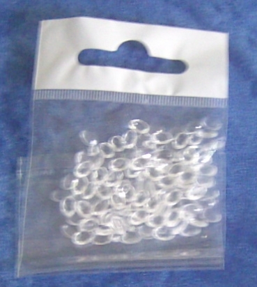 Transparente Steinchen oval mit Facetten