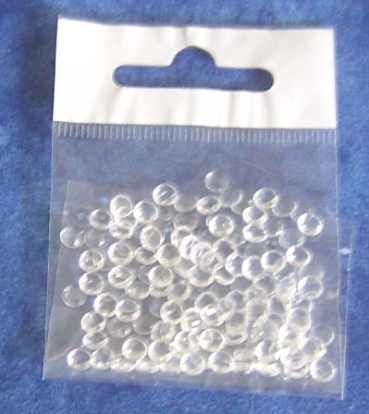 Transparente Steinchen rund mit Facetten