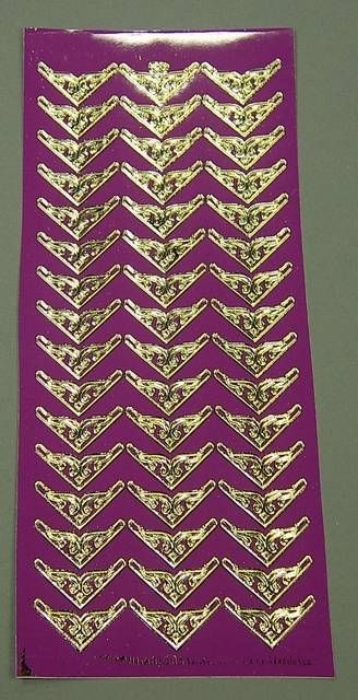 Stickerbogen 10 x 23 cm Ecken aubergine-gold